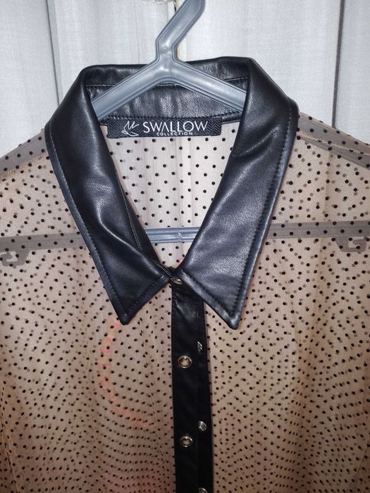 Blusa transparente swallow