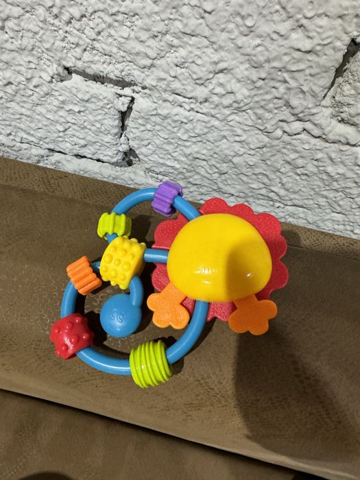 Брязкальце-прорізувач Playgro Лев