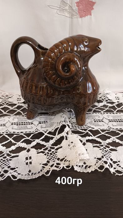 Подсвечник путти.  Козленок. Штоф козак.