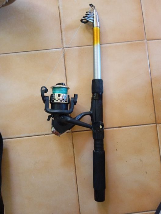 2 Canas de pesca  c/ carrete usadas