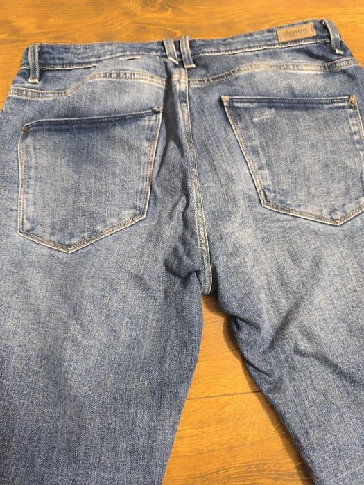 Spodnie jeansowe z przetarciami W30/34