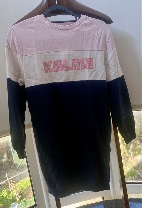 Casacos, vestido e camisola