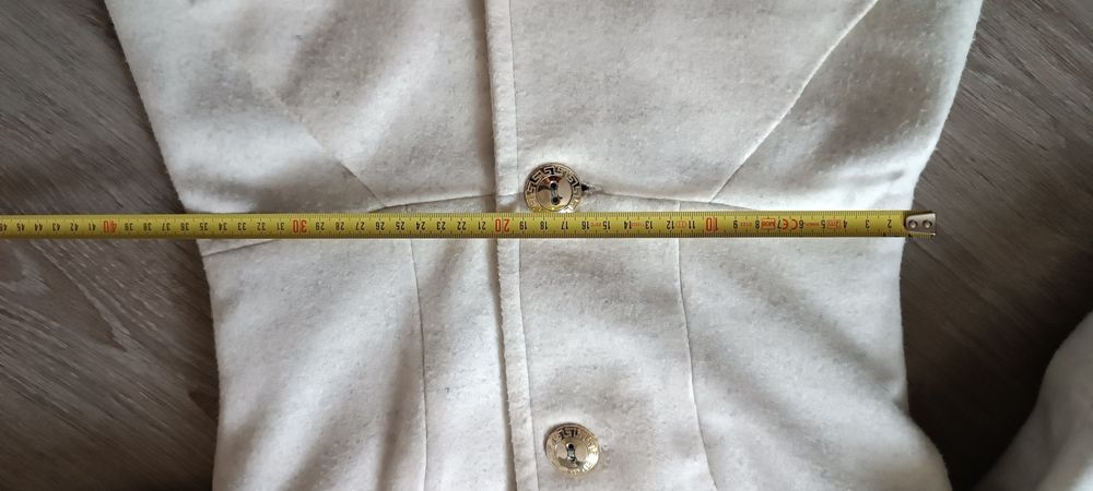 Kremowy płaszcz rozmiar 34