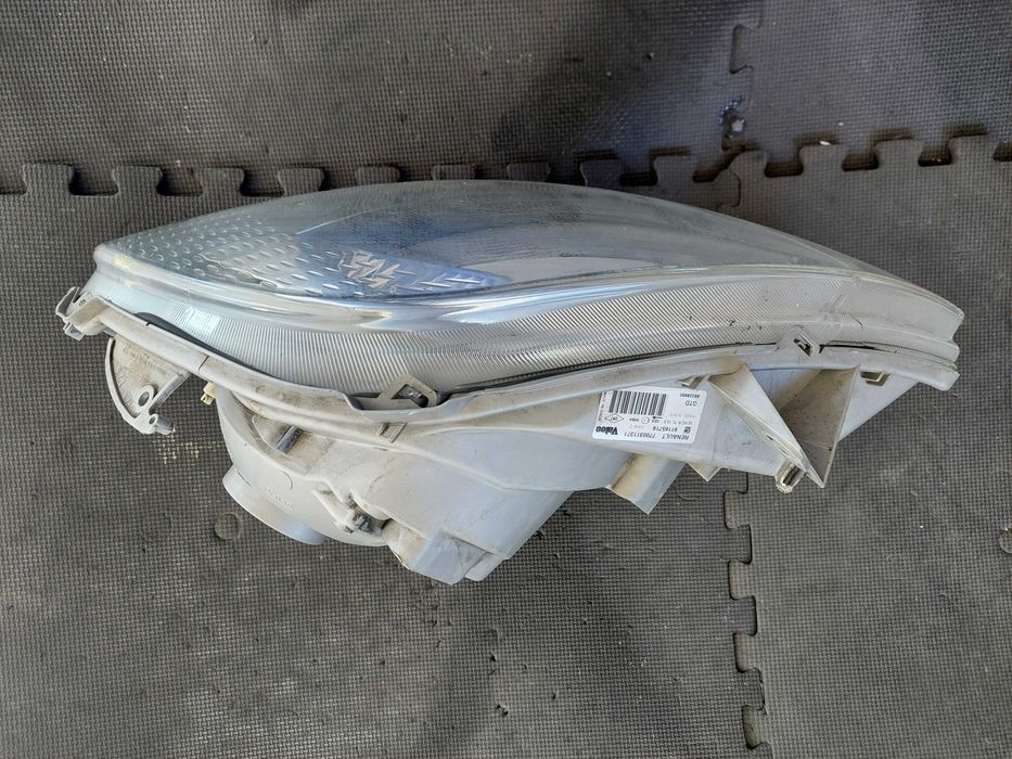 farol esq. Renault trafic