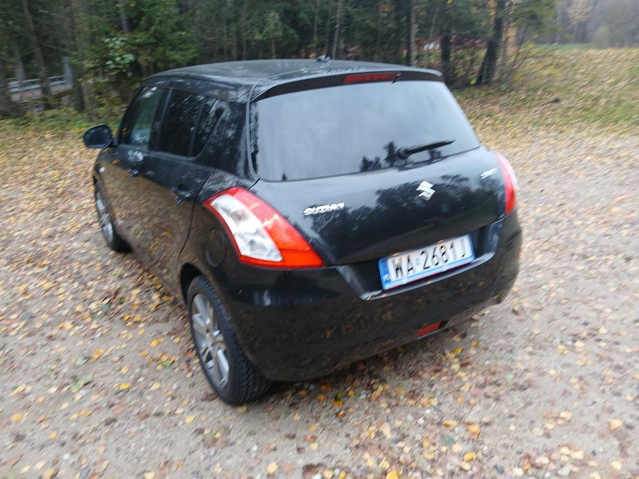 Suzuki Swift  X -TRA