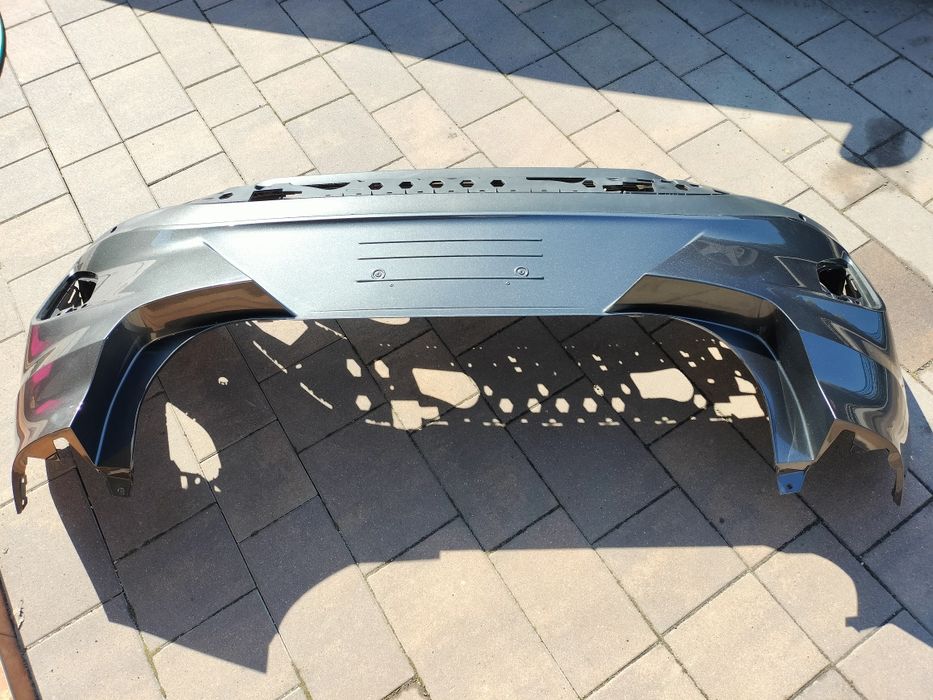 Zderzak tył tylny Ford Puma grafit bez lakierowania magnetic Grey