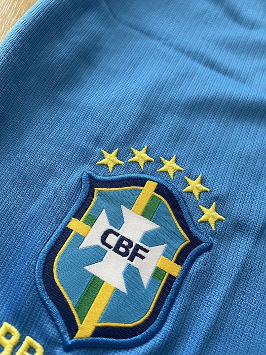 Netmar Jr Brasil criança futebol equipamento