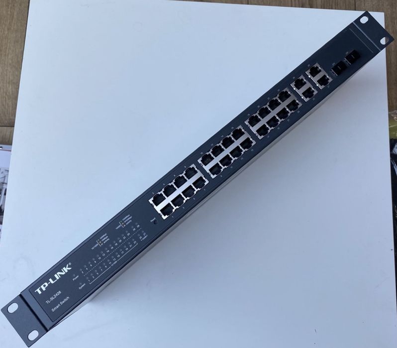 TP-LINK TL-SL2428 Smart Switch 24+4 — przełącznik używany