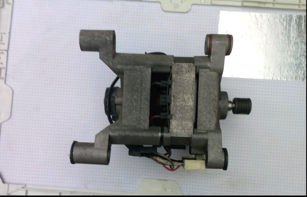 Двигатель стиральной машины.