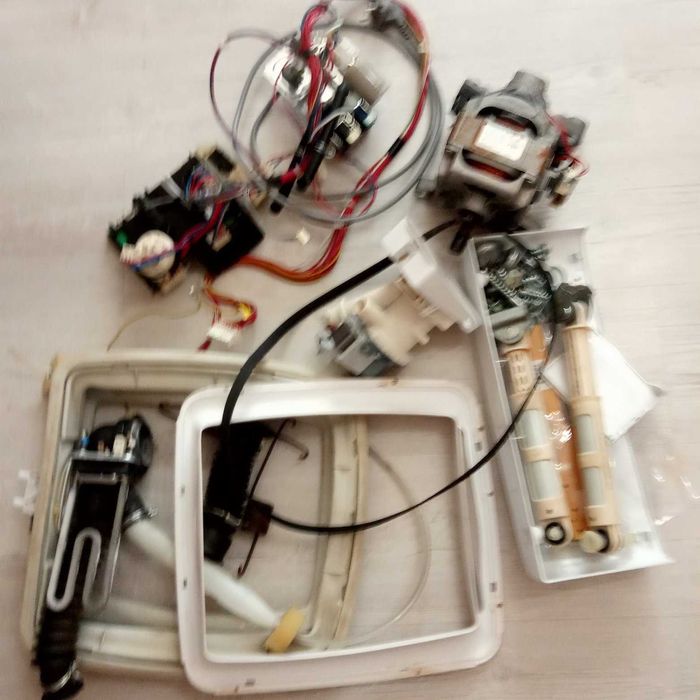 Стиральные машины Candy EVOT 10061D и Smart CTDF-1006 - разборка.