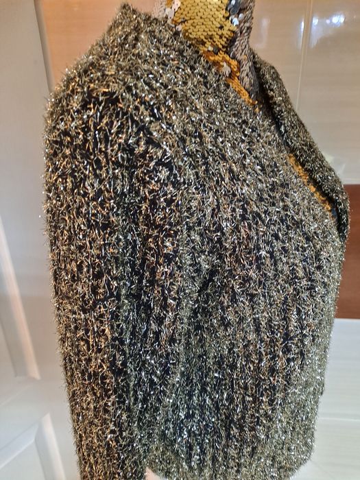 Sliczny sweterek damski.