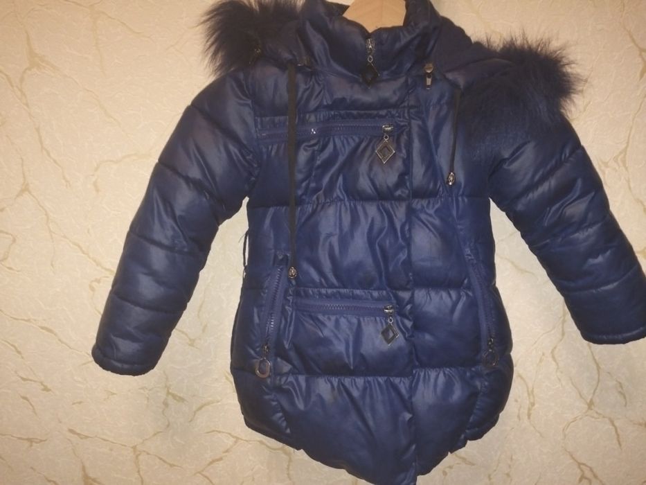 Курточка пуховик подовженого типу. 
Довжина 55
Рукав 40(відгорнутий)
П