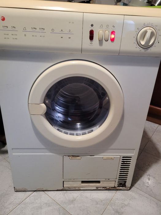 Máquina de secar roupa