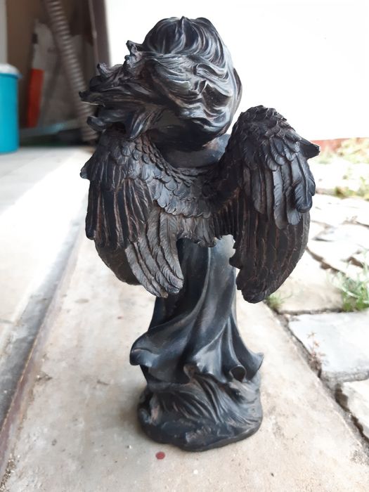 Anjo em massa com vela