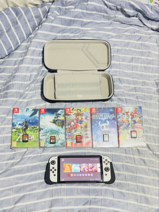 Nintendo Switch OLED + 5 Jogos (Zelda, Mario, Smash, hollow knight) + Extras – Excelente Estado