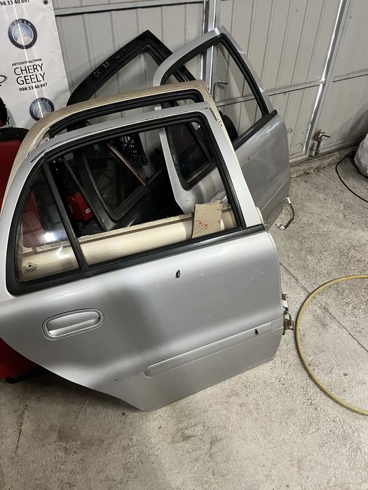 Двері задні Geely ck