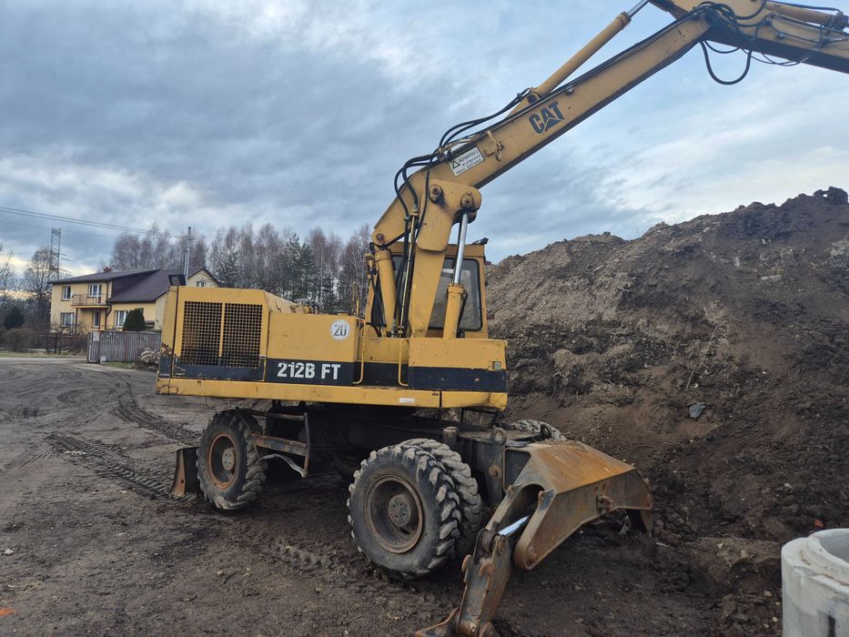 CAT 212 koparka kołowa obrotowa