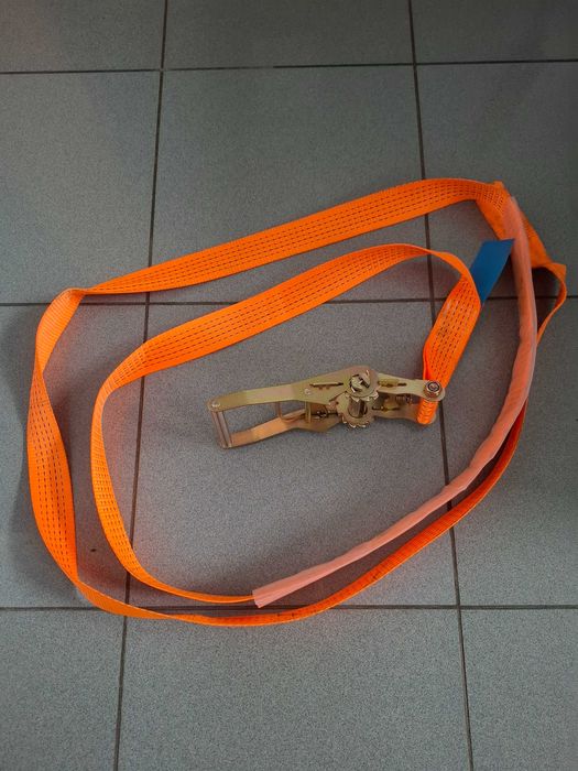 Стяжний ремінь з трищіткою