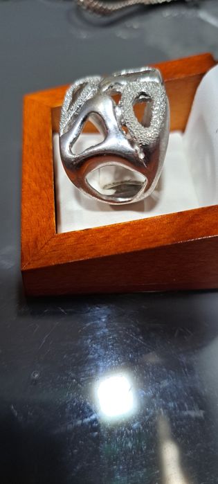 Solid silver ring with official hallmark.514656879751342081
