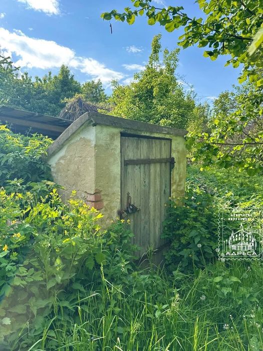 Продаж будинку з земельною ділянкою