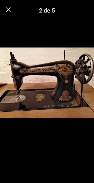 Máquina de costura SINGER ,cabeça e pedal em ferro.