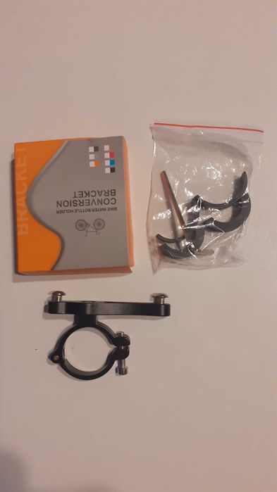 Adapter mocowania koszyka na bidon  do sztycy / kierownicy
