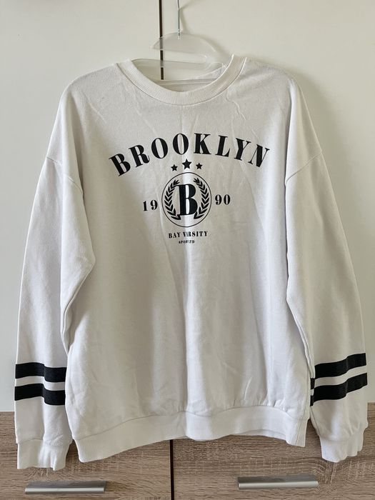 Biała dziewczęca bluza bez kaptura z H&M