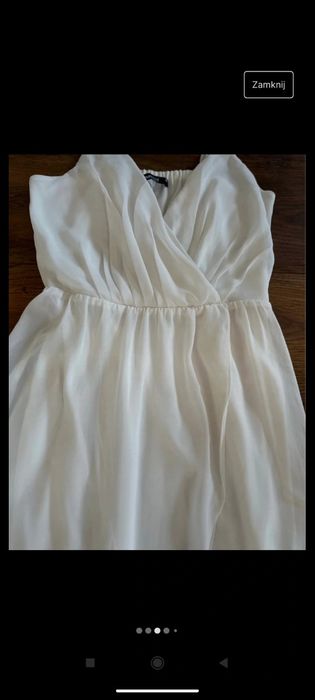 Elegancka biała midi sukienka