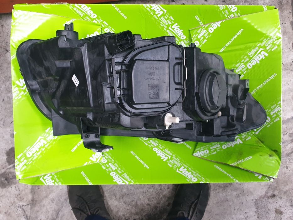 Farol Esquerdo X1 E84