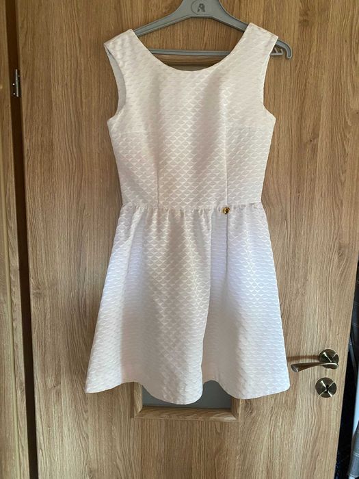 Eleganckie sukienki w rozmiarze 34/36