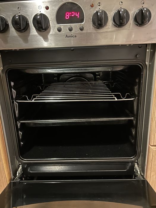 Kuchenka gazowo-elektryczna Amica srebrna wolnostojąca