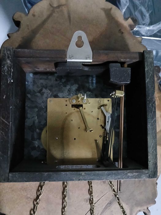 Relógio de pesos e pêndulo