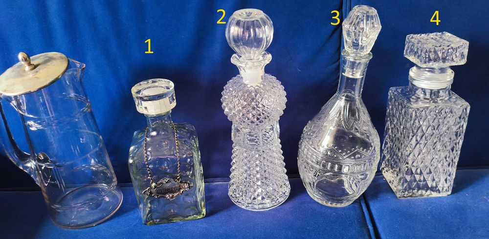 Lote de 4 garrafas de Whisky/Licor antigas