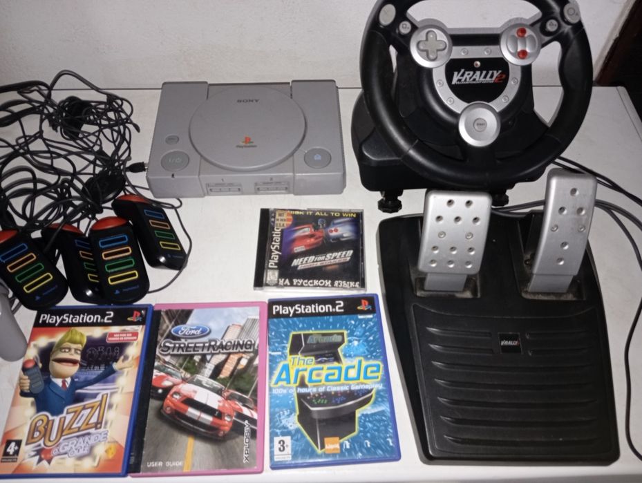 PlayStation 1 e 2 jogos Buzzy com comandos jogos volante e pedais com