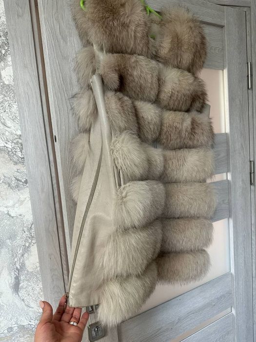 Продам мехову желетку