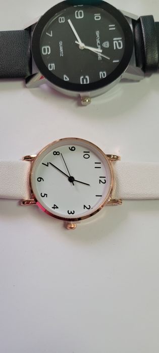 Zegarki biały i czarny. Nowe. Polecam.