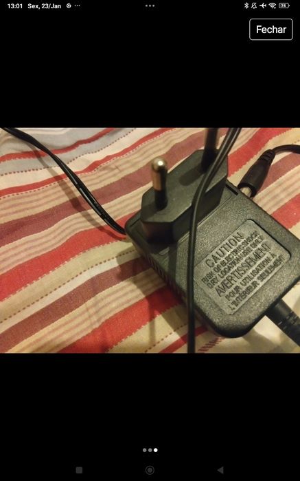 Carregador em bom estado