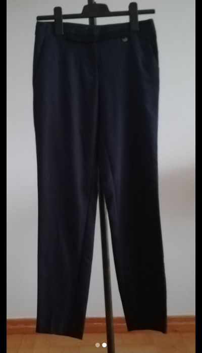 Materiałowe spodnie Orsay, r. 34