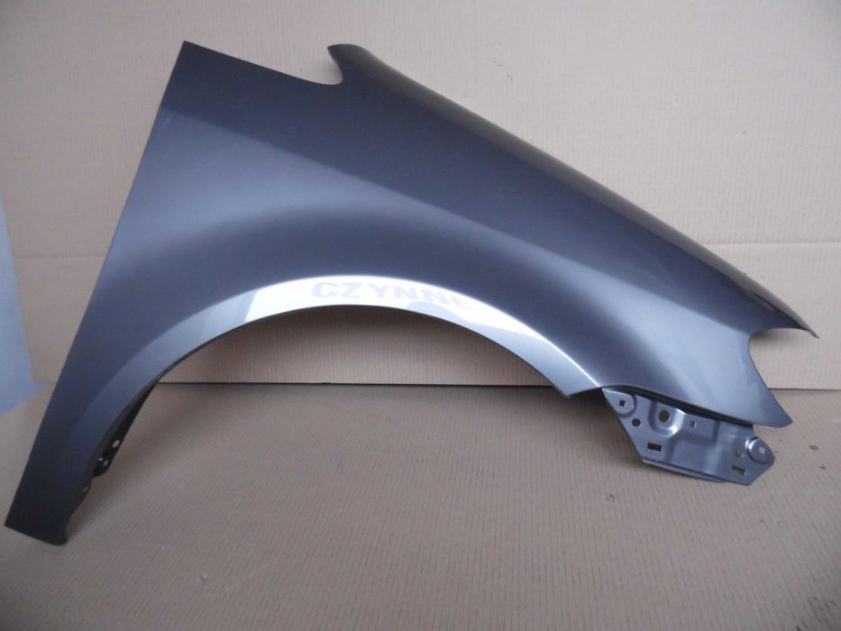 VW Touran 1T2 07-10r Lift prawy błotnik grafitowy LD7S