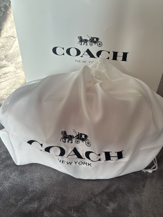 Mala Coach rosa nova