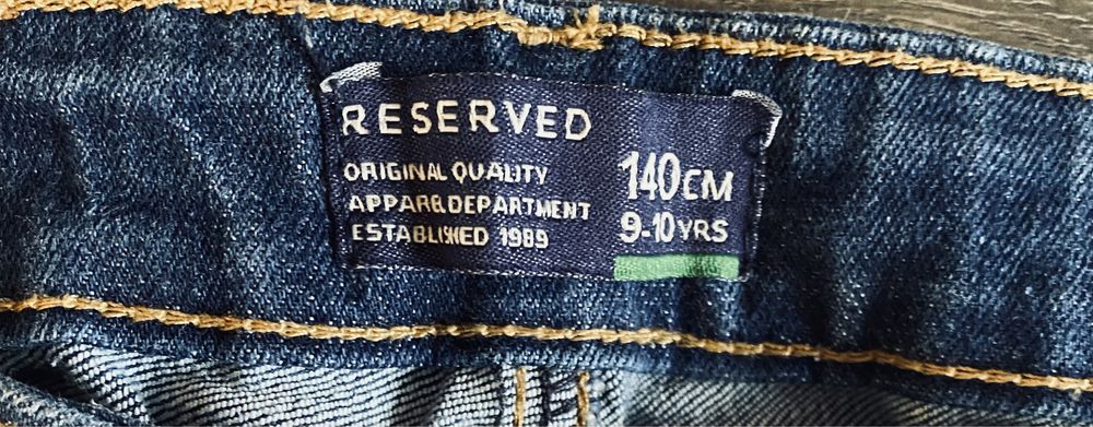 Spodnie jeans dla chłopca granatowe rurki Reserved 140