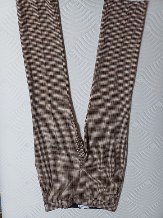 Eleganckie spodnie marki Mango rozm. 34