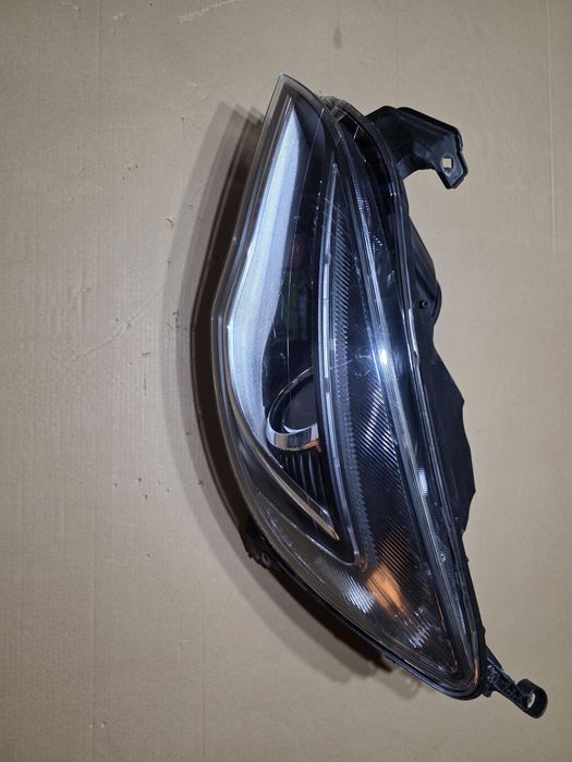 Opel Astra J Lampa przednia 1ZT010012