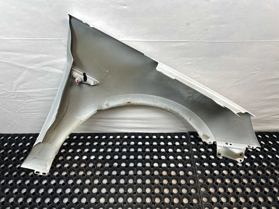 Błotnik przód przedni lewy opel astra v k kod lakieru: y40r 2015-