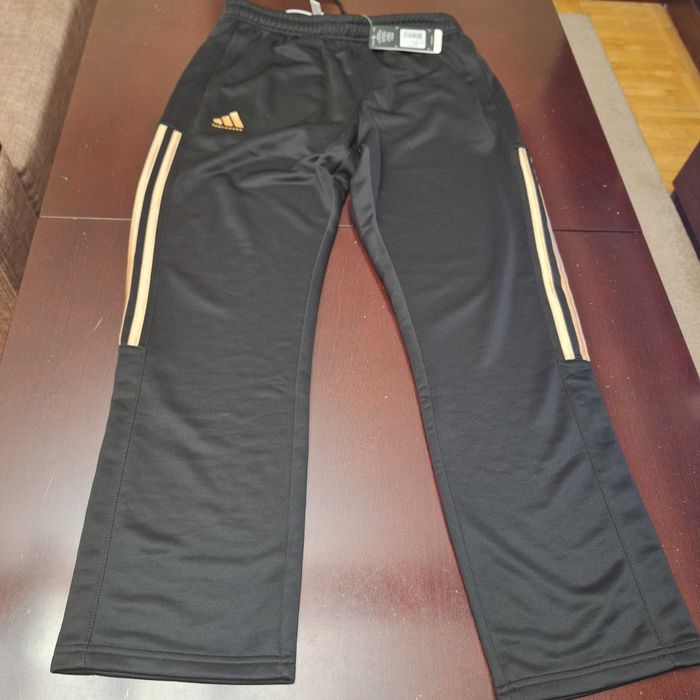 Męskie spodnie dresowe adidas XL nowe ze złotymi lampasami