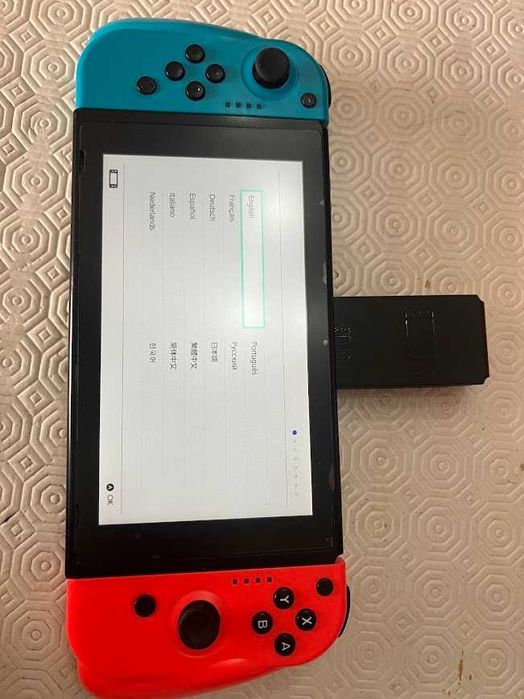 Nintendo Switch1 Completa com comandos extra e caixa de transporte