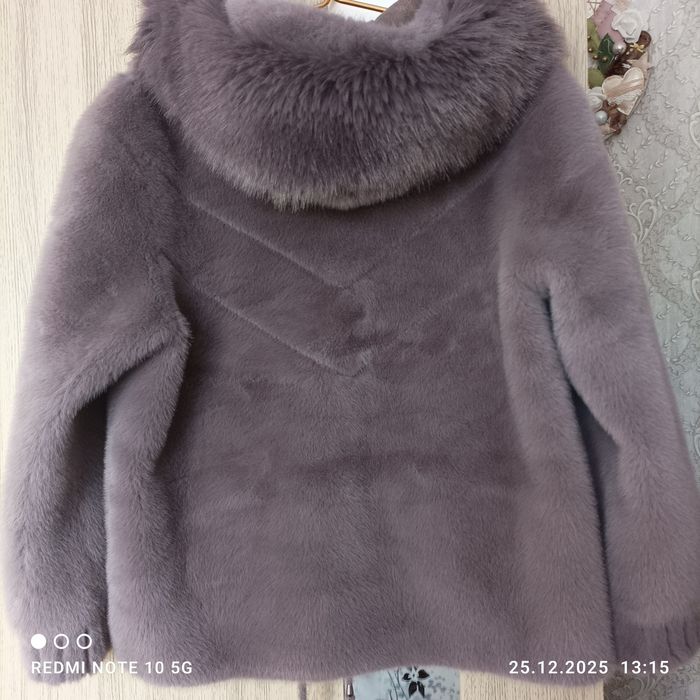 Продам  гарну нову шубку колір бузок  р.54