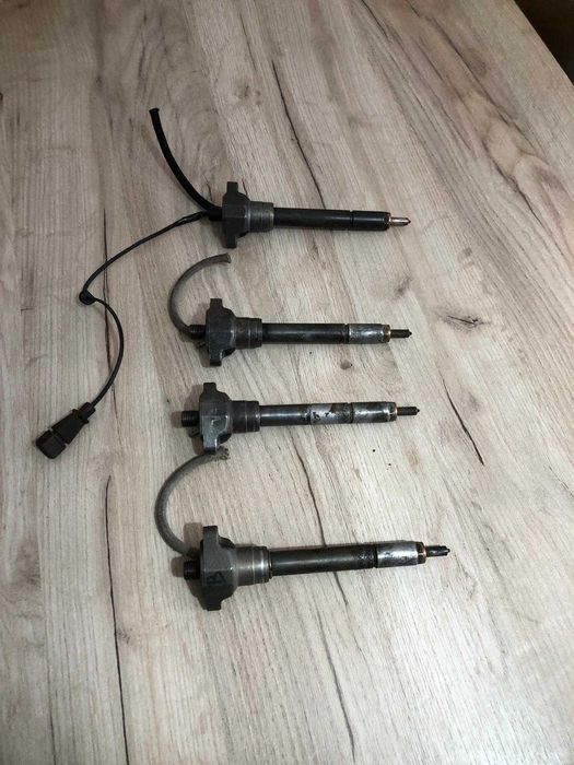Velas e injetores BMW 525
