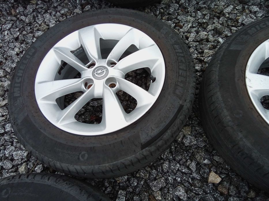 Koła letnie Opel 4x100 6JX15 et39