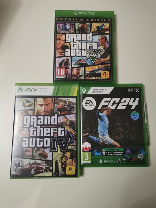 Pudełka do gier FC 24, GTA 5 Xbox One oraz GTA 4 Xbox 360